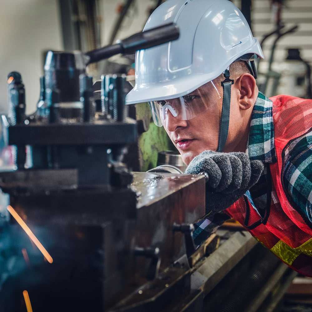worker working on a machine