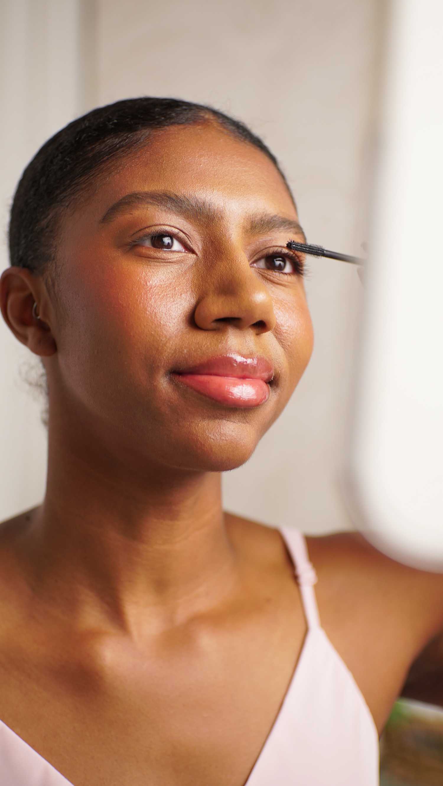 Clinical testing panelist applying mascara product