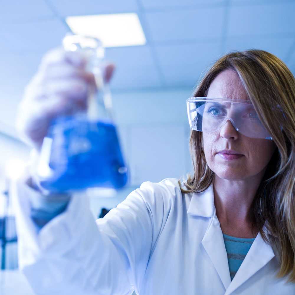 Scientist with flask