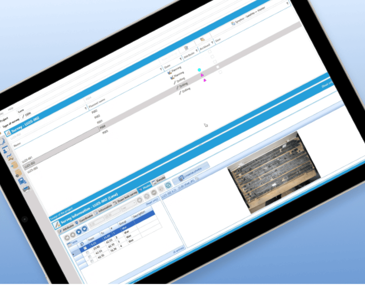 Drillhole database interface with survey list and core tray photo