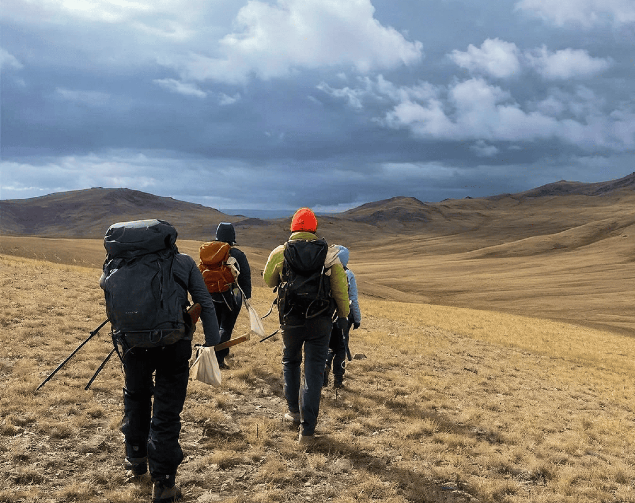 group of explorers exploring open terrain